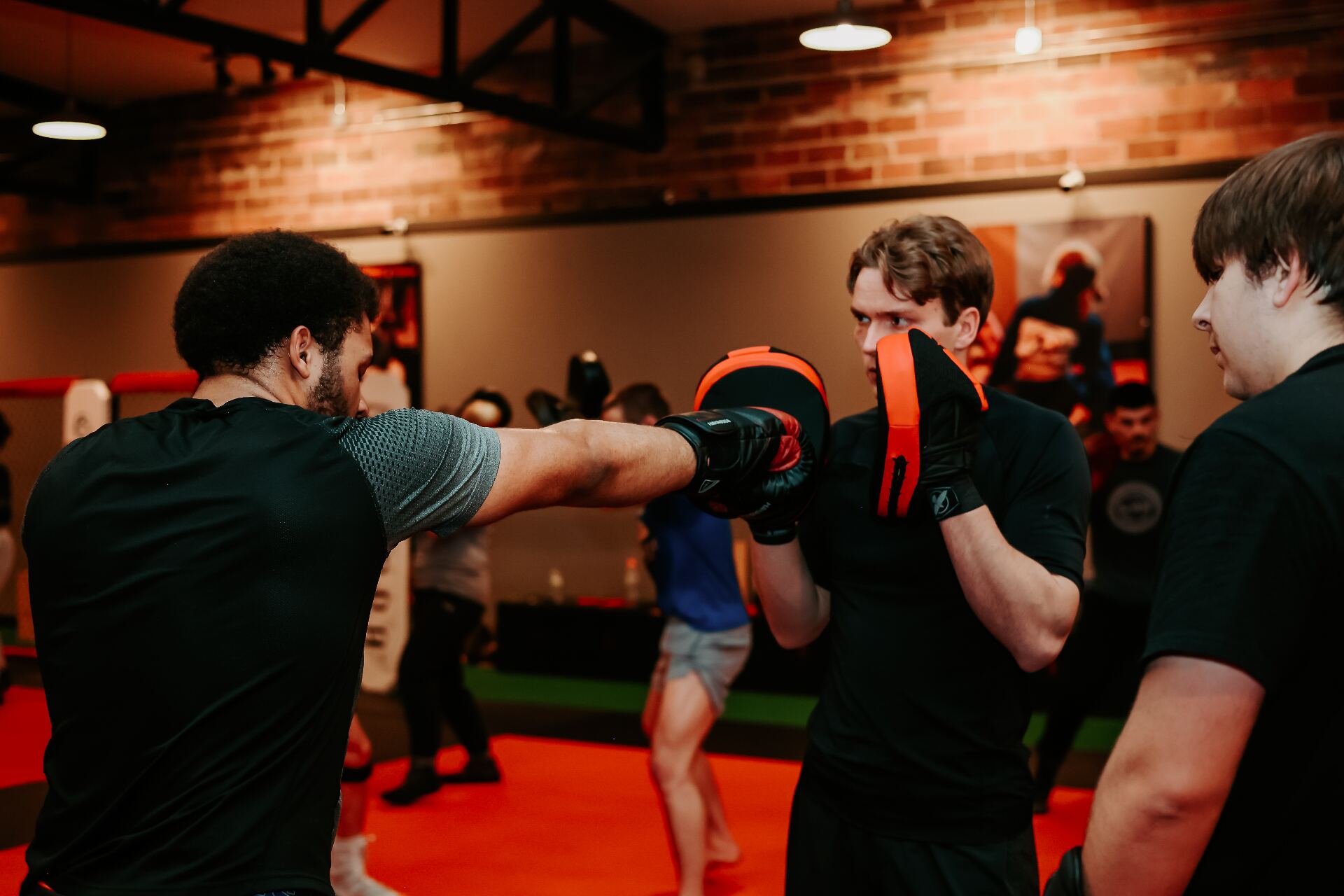 Adult students training Brazilian Jiu-Jitsu at Next Edge Academy in Sioux Falls